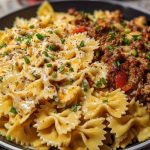 Cheesy Bowtie Pasta with Savory Cajun Ground Beef in Garlic Cream