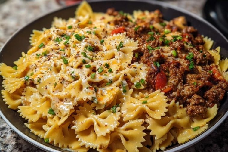 Cheesy Bowtie Pasta with Savory Cajun Ground Beef in Garlic Cream