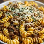 Cheesy Garlic Twisted Pasta with Cajun Ground Beef and Alfredo Velveeta