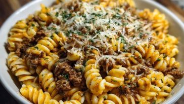 Cheesy Garlic Twisted Pasta with Cajun Ground Beef and Alfredo Velveeta