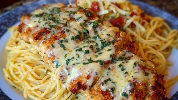 Chicken Smothered in Cheesy Alfredo Three-Cheese Spaghetti Sauce