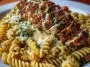 Creamy Cajun Chicken Rotini with Garlic Mozzarella Sauce