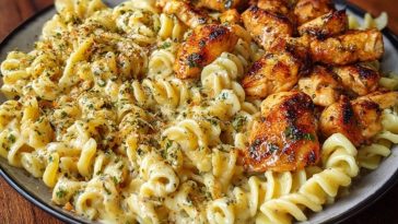Cheesy Alfredo Twisted Pasta with Golden Garlic Butter Chicken in Creamy Sauce