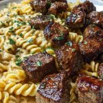 Garlic Butter Steak Bites with Spicy Cajun Alfredo Twisted Pasta