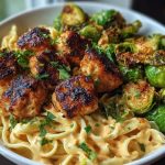 Maple Garlic Chicken Bites with Spicy Cajun Alfredo & Crispy Brussels Twists